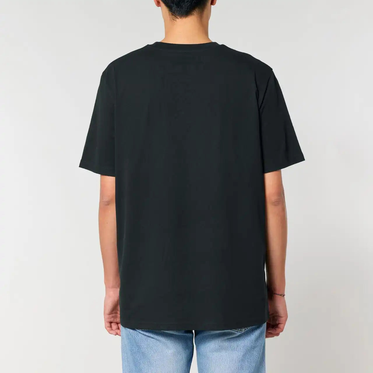 Back view of a guy wearing a bitaxe shirt